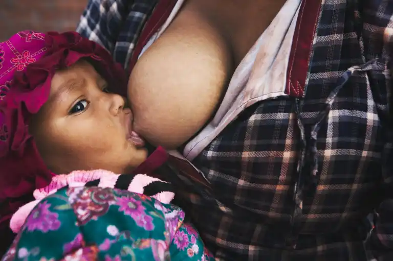 Mother breastfeeding her baby
